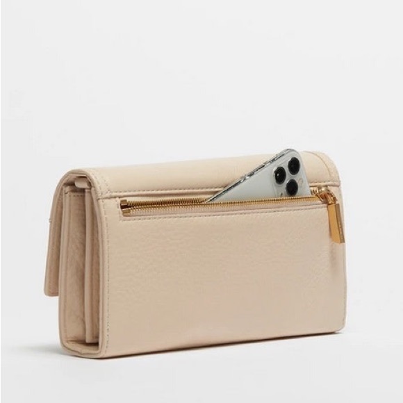 Hammitt AJ crossbody clutch in blush/beige color. Retail for $375. - Picture 2 of 4